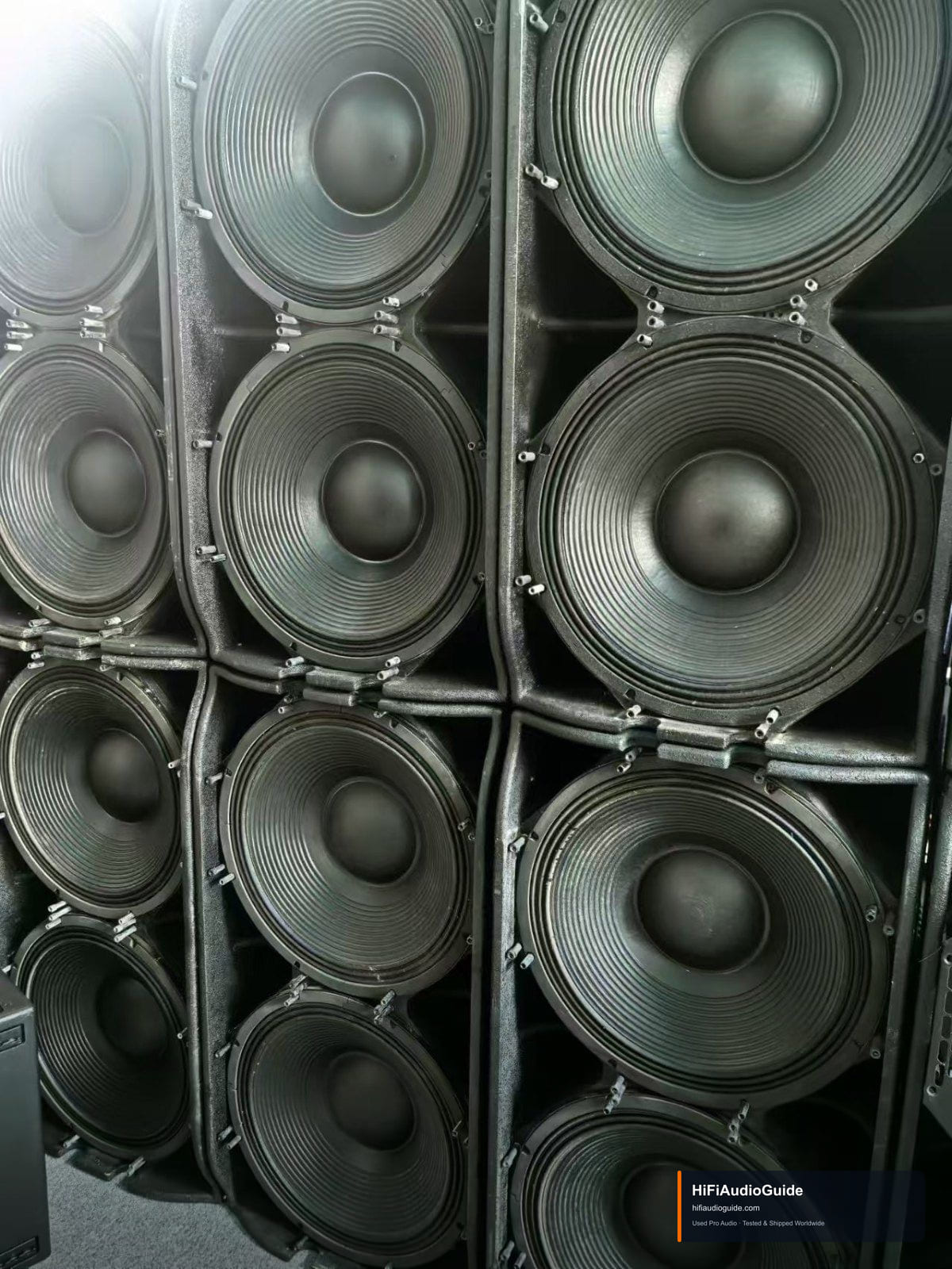 Used Professional Subwoofer Cabinets — Stacked Large-Cone Units with Rigging Hardware (Brand/Model Unconfirmed)
